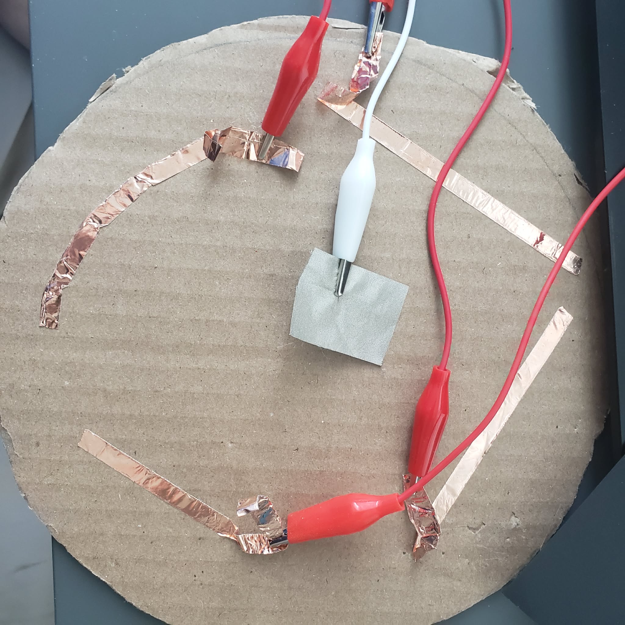 This is a basic prototype of the movement controls. The conductive fabric is connected to the ground.