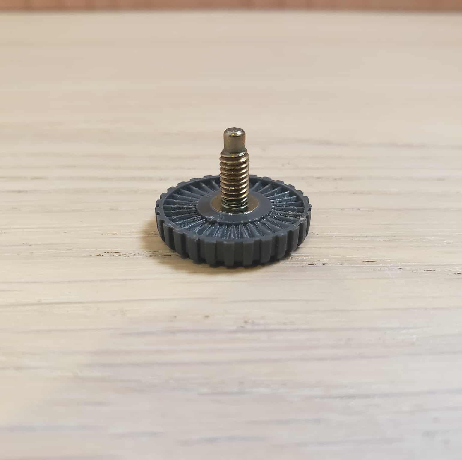 a small part of the knife, use for keeping the blade in place with the object on the right